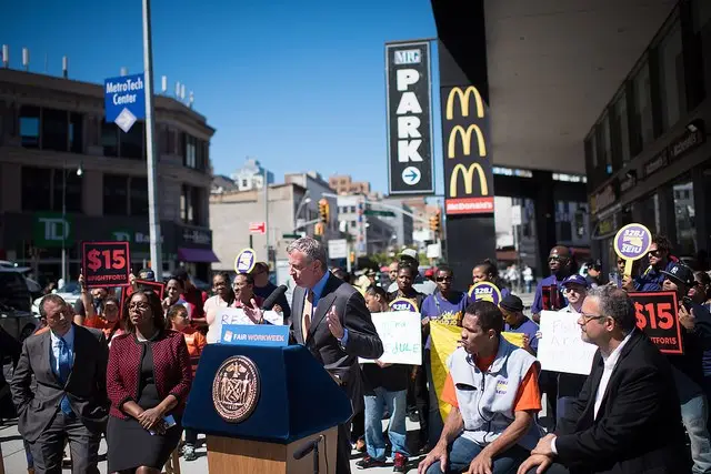 Mayor Bill de Blasio speaks in favor of legislation to regulate scheduling in the fast food and retail industries during a rally in September.